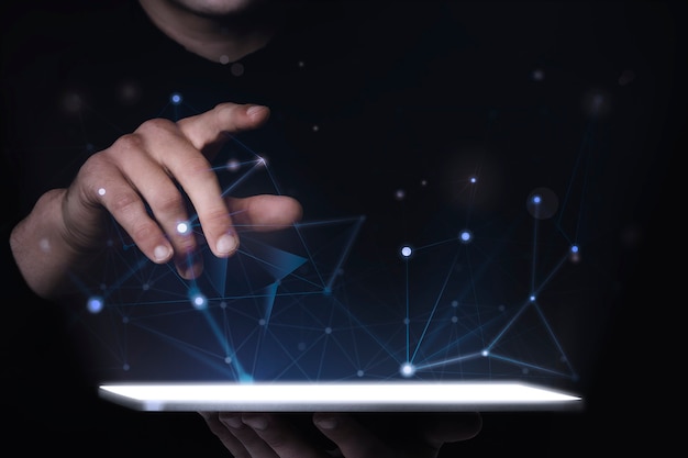 Man using digital tablet psd mockup smart technology Free Photo